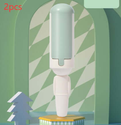 Portable pet hair roller displayed in a stylized environment, showcasing 2 reusable lint rollers.