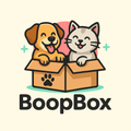 Cute dog and cat happily sitting in a box with the BoopBox logo, representing pet toys and accessories.