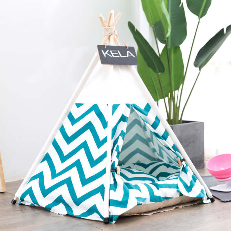 Colorful children's tent with teal and white zigzag design, perfect for playtime and indoor activities.