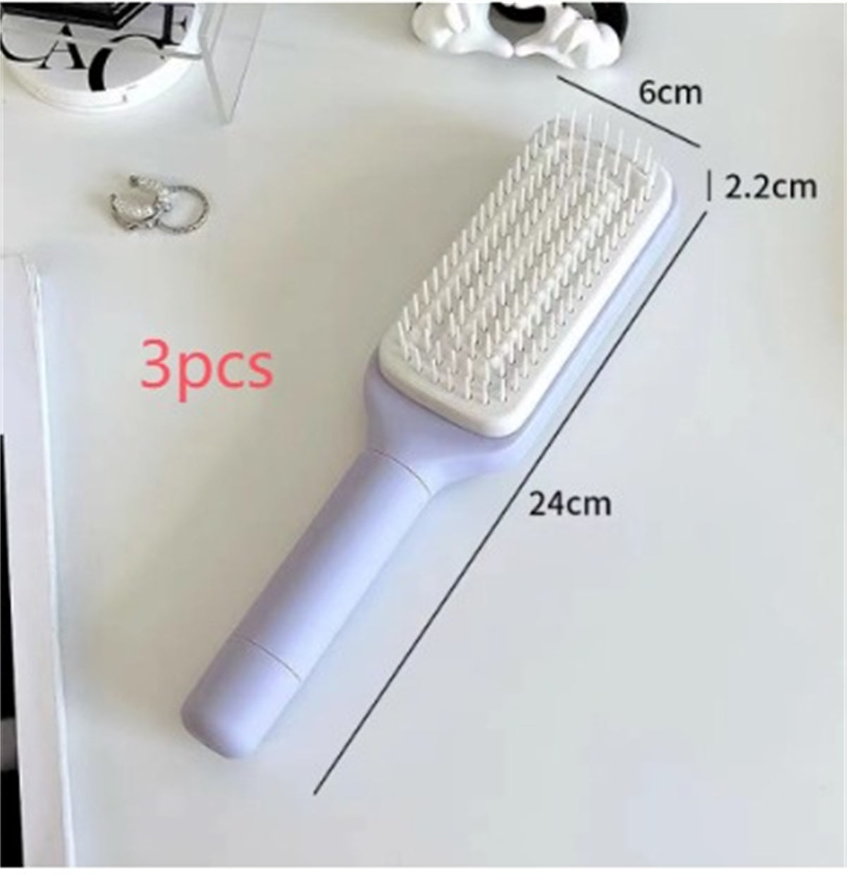 4-in-1 Self-Cleaning Hairbrush